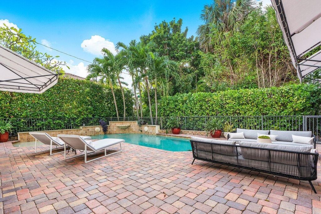 200 Murray Road, West Palm Beach, Florida is a spectacular home including full impact windows and doors, a three car garage, chef's kitchen, pool, gym, spa like master suite with sitting room and terrace, generator, wine cellar, ability to add an elevator, and much more.