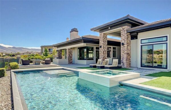 View of Magnificent Single Story Custom Home on Elevated Lot with Spectacular ...