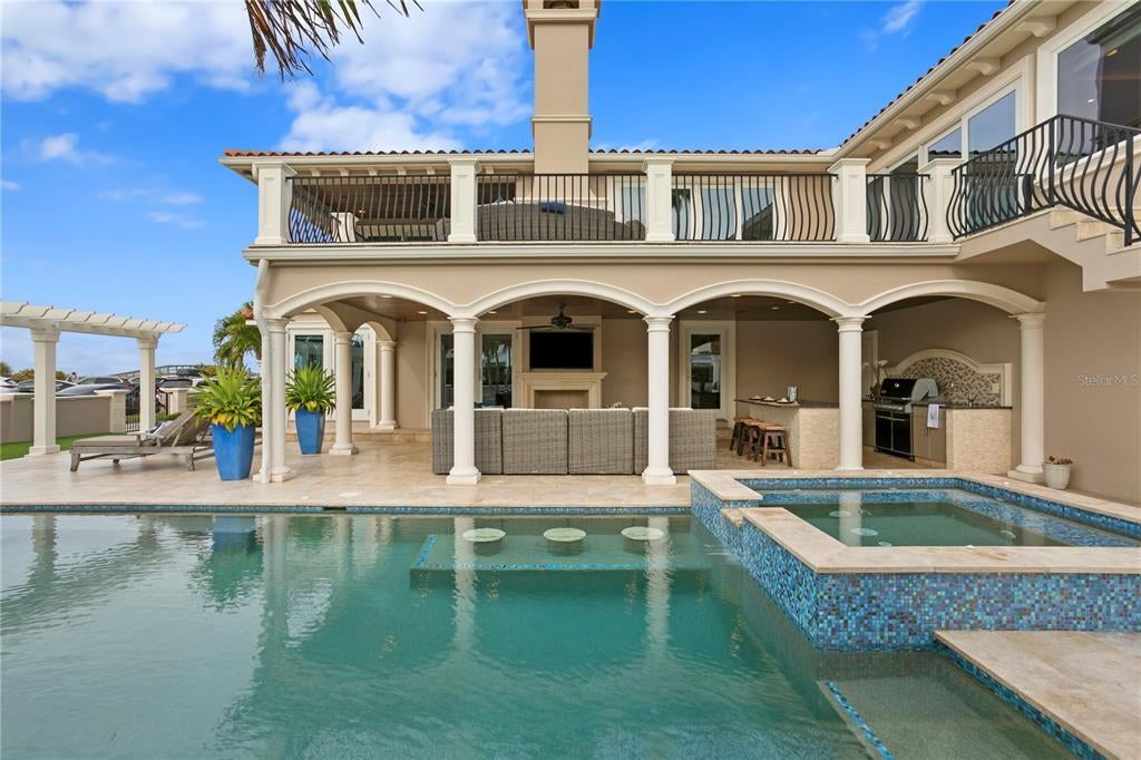 1103 Gulf Way, Saint Pete Beach, Florida is the ultimate beachfront retreat with the interior spaces are generous, the outdoor spaces are tremendous and the surrounding area creates a perfect place for Fun with Family and Friends.