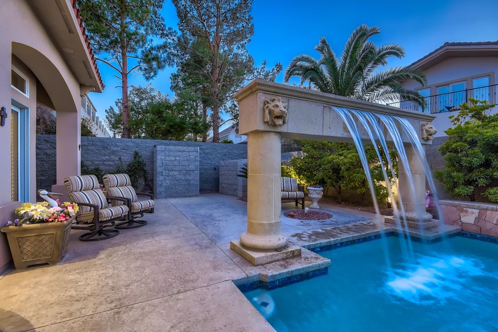 1278 Imperia Drive, Henderson, Nevada is a custom home in the exclusive guard gated community of Rapallo in Seven Hills, wrapped in lush green sculptured landscape in front and back.