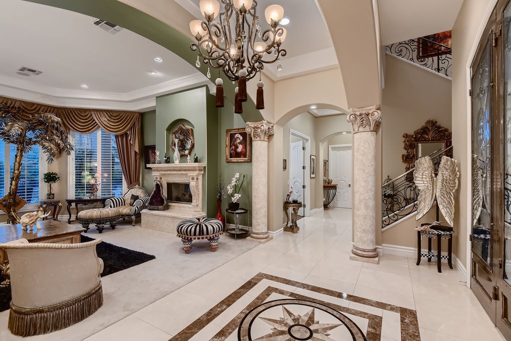 1278 Imperia Drive, Henderson, Nevada is a custom home in the exclusive guard gated community of Rapallo in Seven Hills, wrapped in lush green sculptured landscape in front and back.