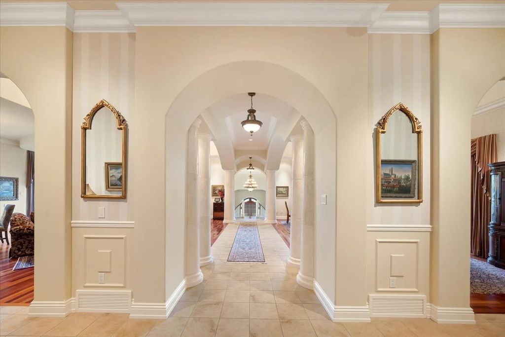 The Home in Spokane offers grand foyer with mirror staircases & domed glass ceilings, now available for sale. This home located at 13310 S Covey Run Ln, Spokane, Washington