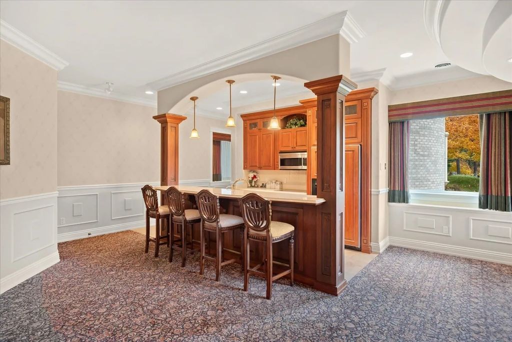 The Home in Spokane offers grand foyer with mirror staircases & domed glass ceilings, now available for sale. This home located at 13310 S Covey Run Ln, Spokane, Washington