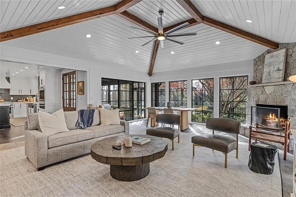 The House in Atlanta offers the lush green resort-style outdoor living with the saltwater heated pool and spa, dramatic lounge-side fireplace, and more now available for sale. This home located at 172 Blackland Dr NW, Atlanta, Georgia