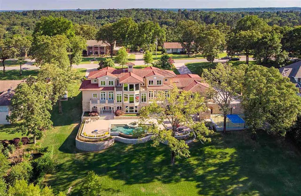 54 River Ridge Road, Little Rock, Arkansas is a spectacular home with breathtaking river views and impeccable quality construction, amenities include 4 car garage, fabulous outdoor living with pool, sports court ect!