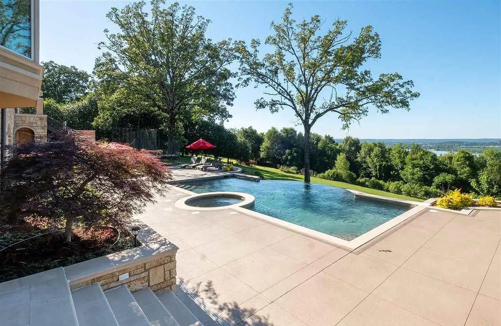 54 River Ridge Road, Little Rock, Arkansas is a spectacular home with breathtaking river views and impeccable quality construction, amenities include 4 car garage, fabulous outdoor living with pool, sports court ect!