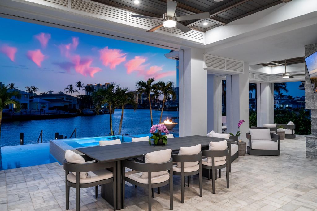3801 Crayton Road, Naples, Florida is a spectacular reimagined turn-key furnished Park Shore Residence with with an open floor plan, soaring ceilings, European wide-plank white oak flooring and natural light flowing throughout.