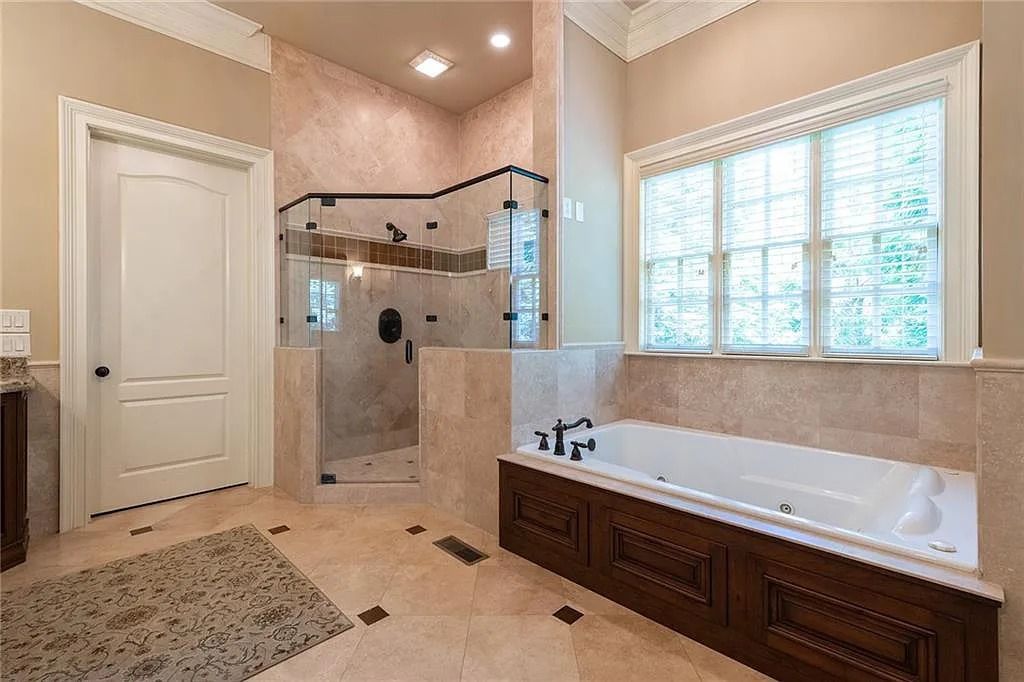 The Estate in Sandy Springs is a luxurious home having a great open floor plan layout of space now available for sale. This home located at 195 Saint Nicholas Cir, Sandy Springs, Georgia; offering 06 bedrooms and 08 bathrooms with 7,799 square feet of living spaces. 