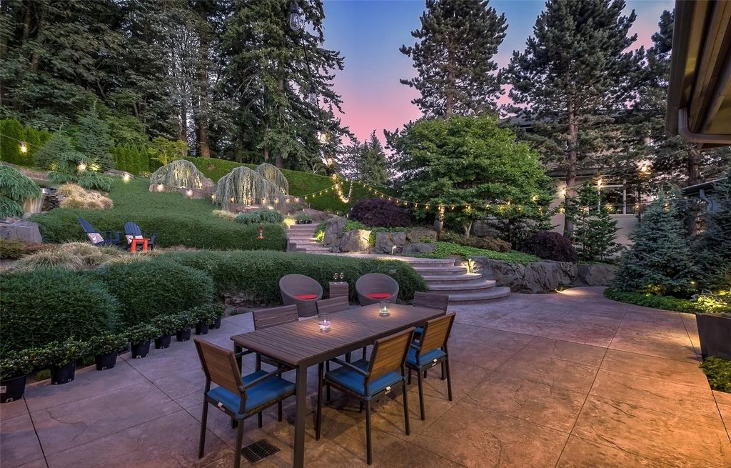 The House in Bellevue is a custom-built home with mesmerizing views of the lake, Seattle and beyond now available for sale. This home located at 5110 145th Place SE, Bellevue, Washington
