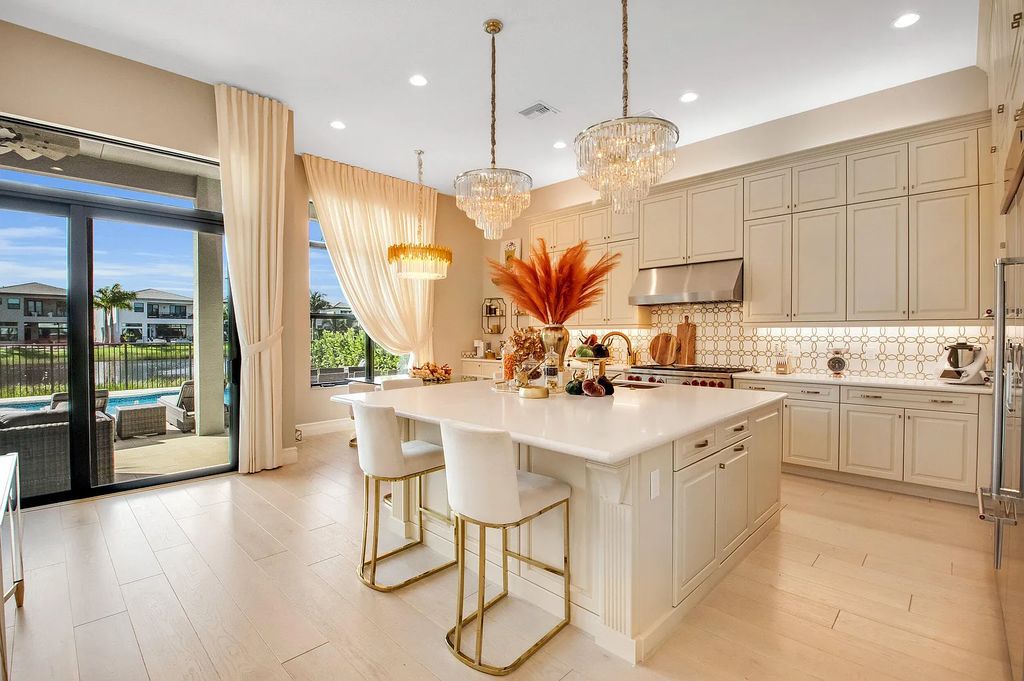 9016 Chauvet Way, Boca Raton, Florida, is built in the highly desired community of Boca Bridges and has more than 5000 square feet. This home is beautifully appointed with custom window treatments, stunning chandeliers, high-end furnishings and glamorous decor throughout.
