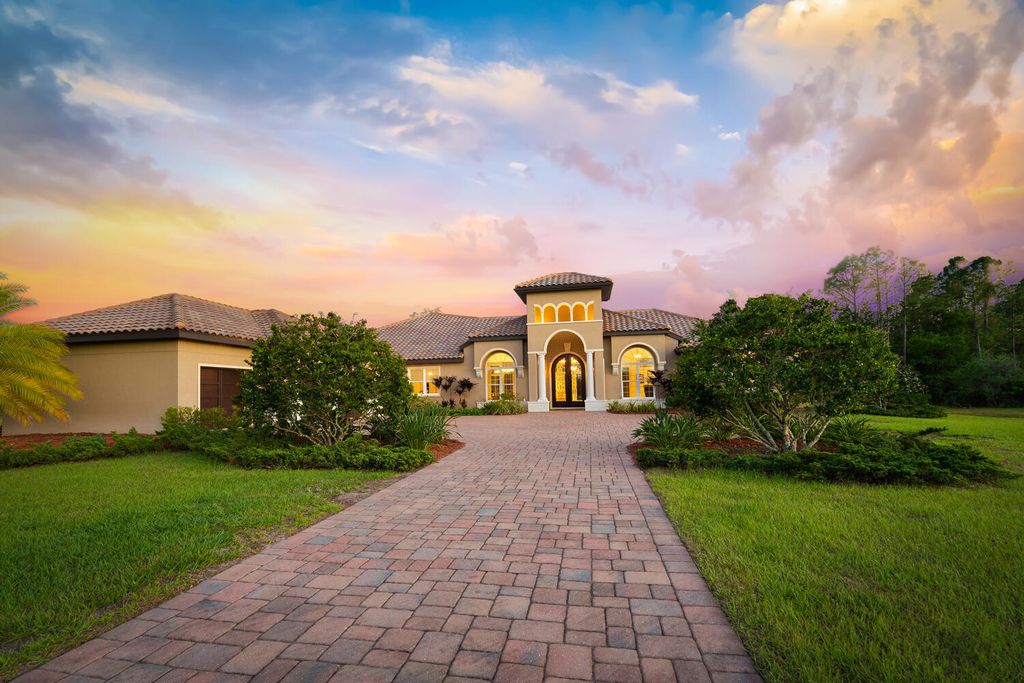 20706 79th Ave East, Bradenton, Florida is a gorgeous custom-built home situated on 7.65 acres and was built in 2014 by Denny Yoder of Yoder Homes and combines exquisite design with quality and comfort to meet all that is needed to live the Florida lifestyle.