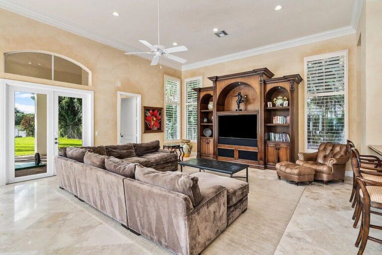 This 5 Million Beautiful Home is Built on Over an Acre of Long Lake