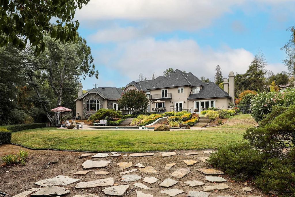 16050 Viewfield Road, Monte Sereno, California is an incredible property on 1.4 usable acres just a few short blocks to vibrant downtown Los Gatos boasting grand semi-circular staircase and vaulted ceilings, park-like back yard, 800 bottle wine cellar, and more.