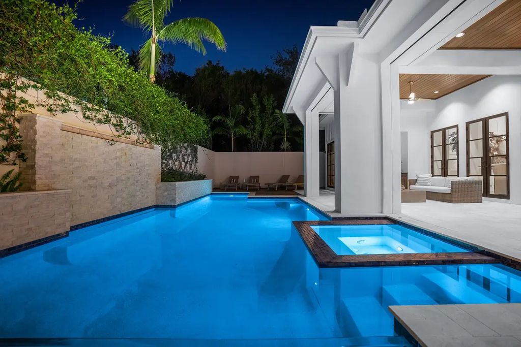9201 Mercato Way, Naples, Florida is a magnificent gem in the heart of the Residences at Mercato just minutes from the famous Vanderbilt Beach with a custom outdoor oasis, an open floor plan, and designer touches throughout.