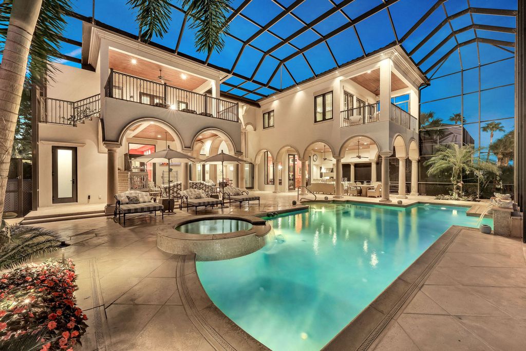 1450 Gulfstar Drive South, Naples, Florida is an impressive home combining the ultimate in interior finishes and exterior amenities, over 4,800 square feet of outdoor living area, unmatched design and exquisite finishes throughout.