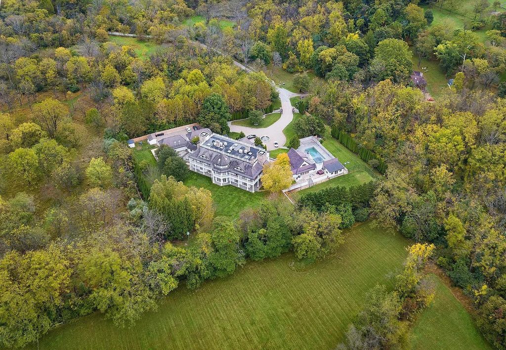 The Residence in Malvern offers three stories of luxury-filled living with breathtaking mountain views, now available for sale. This home located at 1494 Treeline Dr, Malvern, Pennsylvania