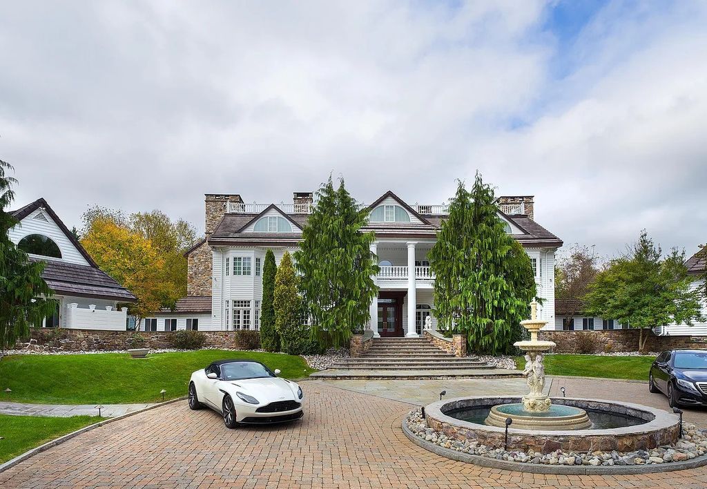 The Residence in Malvern offers three stories of luxury-filled living with breathtaking mountain views, now available for sale. This home located at 1494 Treeline Dr, Malvern, Pennsylvania