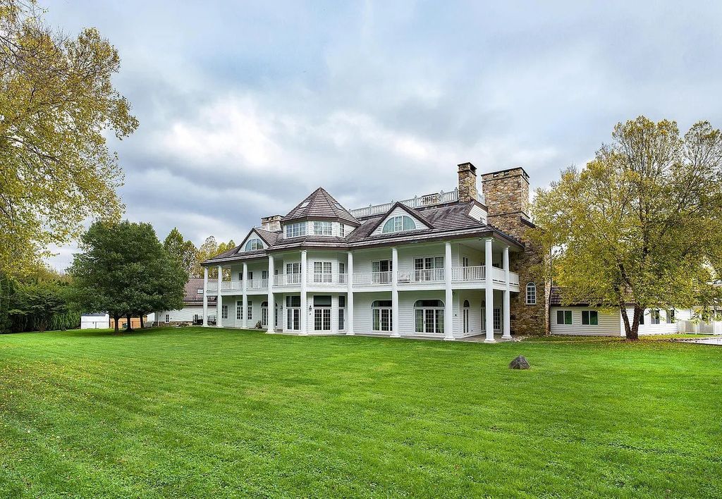 The Residence in Malvern offers three stories of luxury-filled living with breathtaking mountain views, now available for sale. This home located at 1494 Treeline Dr, Malvern, Pennsylvania