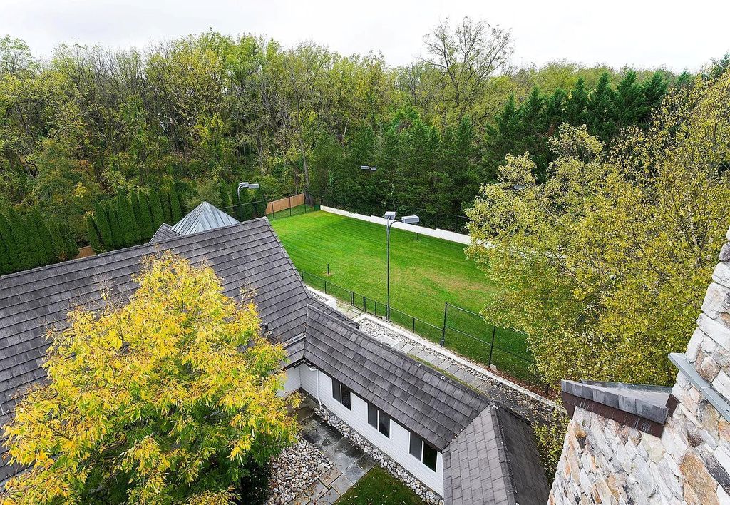 The Residence in Malvern offers three stories of luxury-filled living with breathtaking mountain views, now available for sale. This home located at 1494 Treeline Dr, Malvern, Pennsylvania