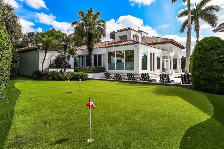 This Contemporary Residence in Palm Beach Gardens with 380+ Feet of Lake Frontage and a Private Putting Green is Offering $17.5 Million