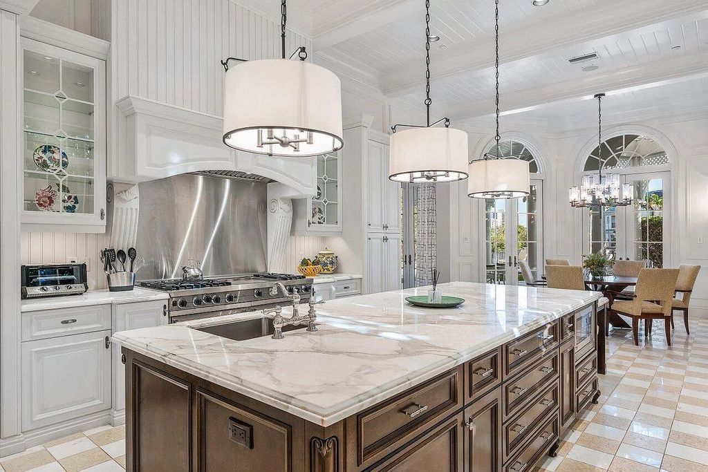 4836 Sanctuary Lane, Boca Raton, Florida is located in the highly sought-after, gated community, The Sanctuary. This gorgeous waterfront residence sits on 70 feet of waterfront age featuring an elegant, transitional interior.