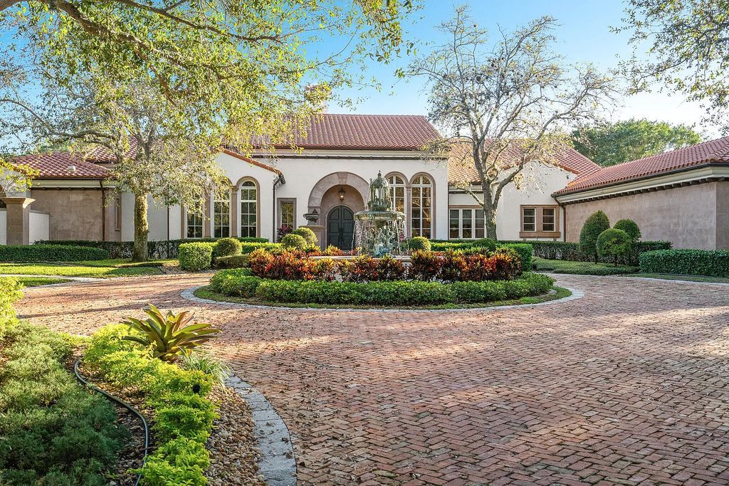 6030 Le Lac Road, Boca Raton, Florida, designed by award-winning architect Randall Stofft, is an exquisite lakefront estate located on 2.13 acres of meticulously manicured grounds within Boca Raton's most prestigious neighborhoods.
