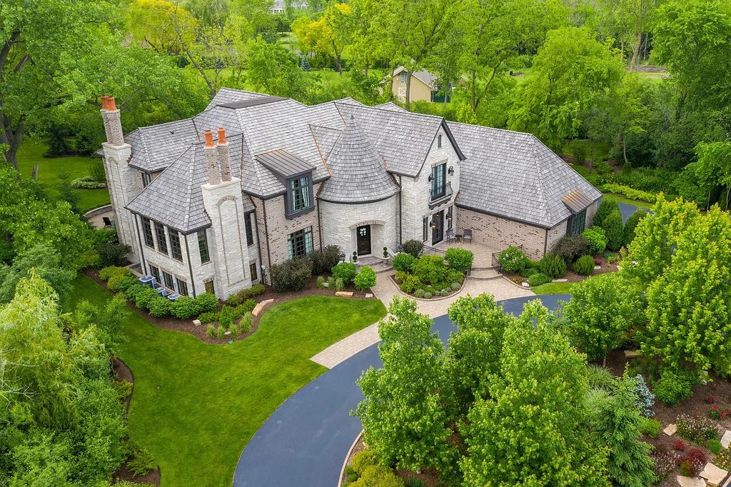 The Home in Bannockburn is a stunning mixture of stone, brick, and stucco, now available for sale. This home located at 21 Aberdeen Ct, Bannockburn, Illinois