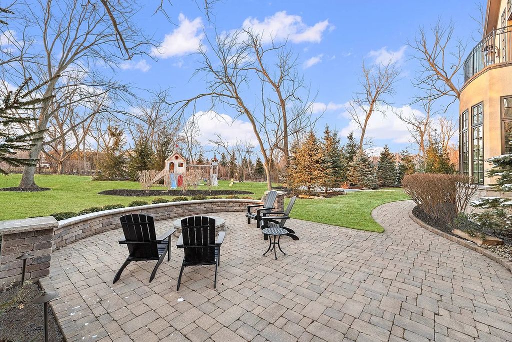 The Home in Bannockburn is a stunning mixture of stone, brick, and stucco, now available for sale. This home located at 21 Aberdeen Ct, Bannockburn, Illinois