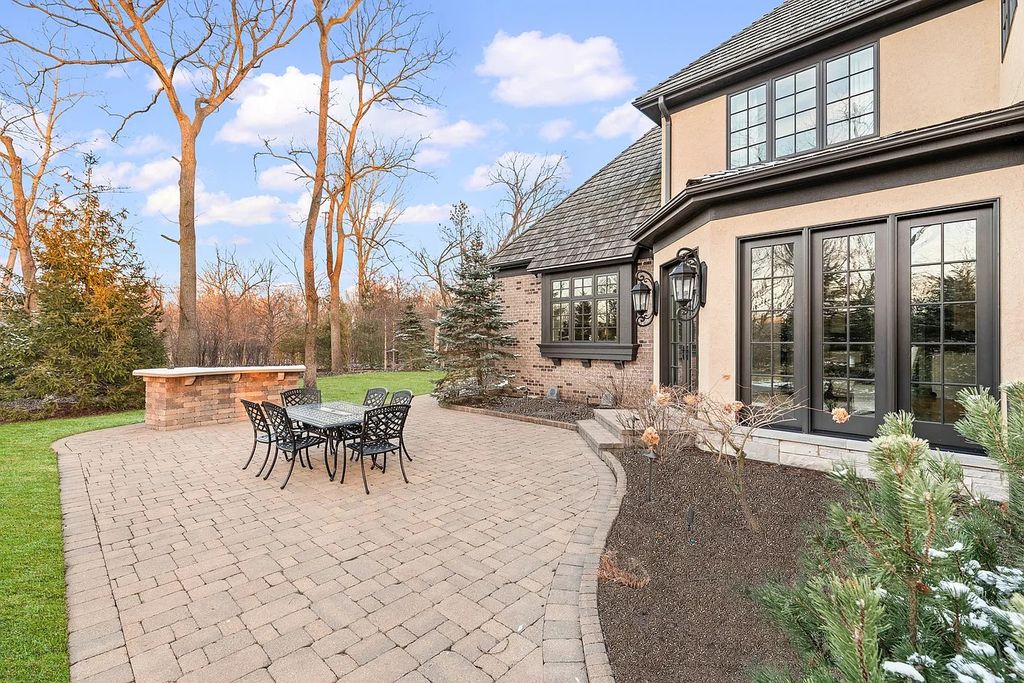 The Home in Bannockburn is a stunning mixture of stone, brick, and stucco, now available for sale. This home located at 21 Aberdeen Ct, Bannockburn, Illinois
