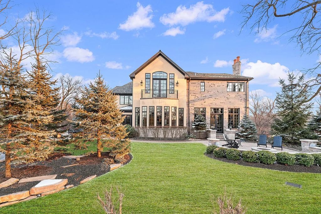 The Home in Bannockburn is a stunning mixture of stone, brick, and stucco, now available for sale. This home located at 21 Aberdeen Ct, Bannockburn, Illinois