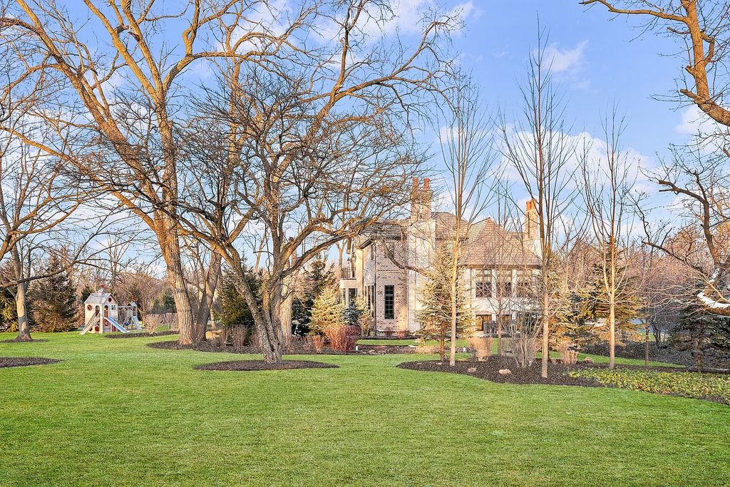 The Home in Bannockburn is a stunning mixture of stone, brick, and stucco, now available for sale. This home located at 21 Aberdeen Ct, Bannockburn, Illinois