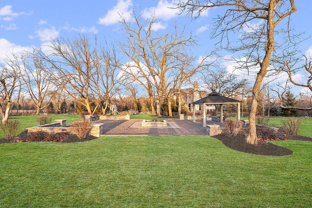 The Home in Bannockburn is a stunning mixture of stone, brick, and stucco, now available for sale. This home located at 21 Aberdeen Ct, Bannockburn, Illinois