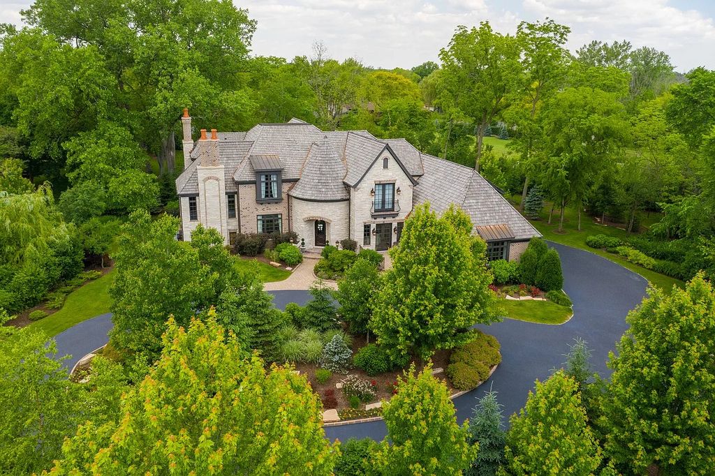 The Home in Bannockburn is a stunning mixture of stone, brick, and stucco, now available for sale. This home located at 21 Aberdeen Ct, Bannockburn, Illinois