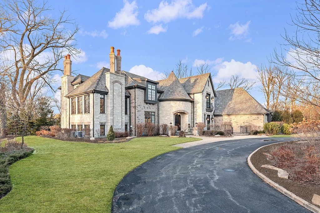 The Home in Bannockburn is a stunning mixture of stone, brick, and stucco, now available for sale. This home located at 21 Aberdeen Ct, Bannockburn, Illinois