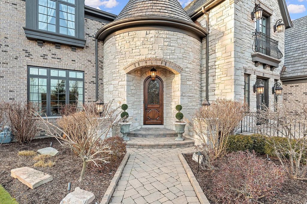 The Home in Bannockburn is a stunning mixture of stone, brick, and stucco, now available for sale. This home located at 21 Aberdeen Ct, Bannockburn, Illinois