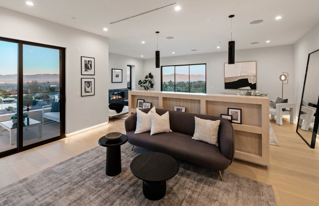 16430 Westfall Place is a truly extraordinary property that offers the best of both worlds - a serene hilltop environment with breathtaking natural beauty, and the luxuries of modern living. If you're looking for the ultimate L.A. lifestyle