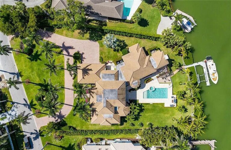 Discover the Ultimate in Coastal Living at this Gorgeous 2-Story Admiralty Parade Home in Naples for $25.5 Million!
