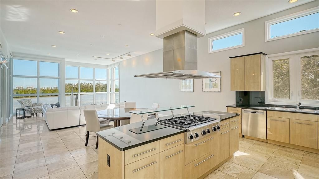 9137 Midnight Pass Road, Sarasota, Florida, is designed by the original owner and architect, Tony Ngai, and features expansive bay views from north to south on a quiet stretch.
