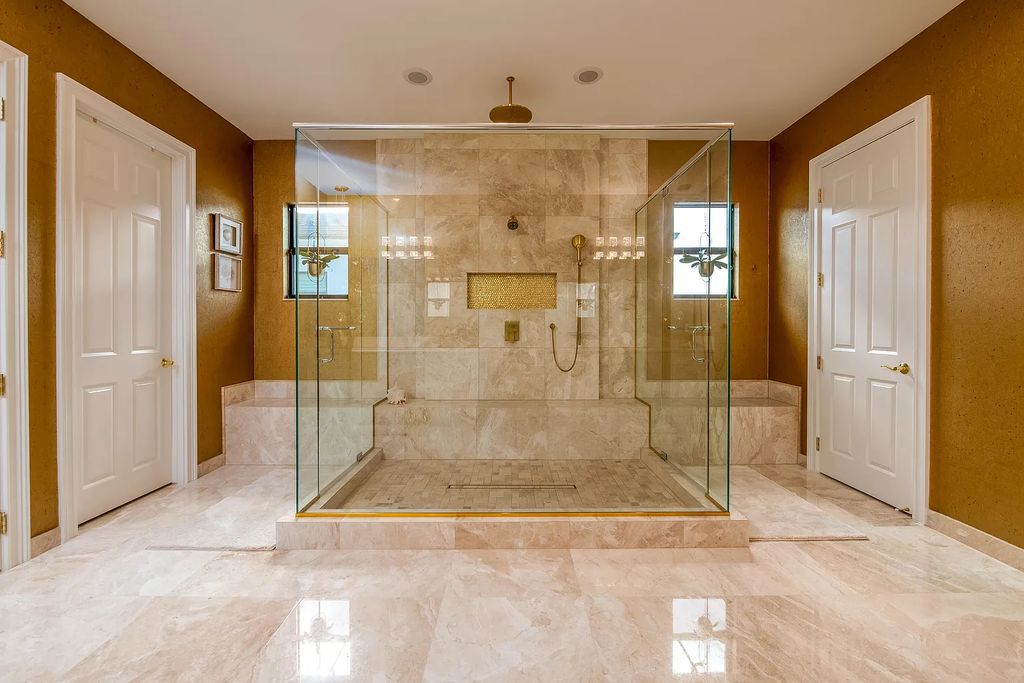 9738 Chianti Classico Terrace, Boca Raton, Florida, is a grandiose model home with remarkable amenities and an active racquet club.