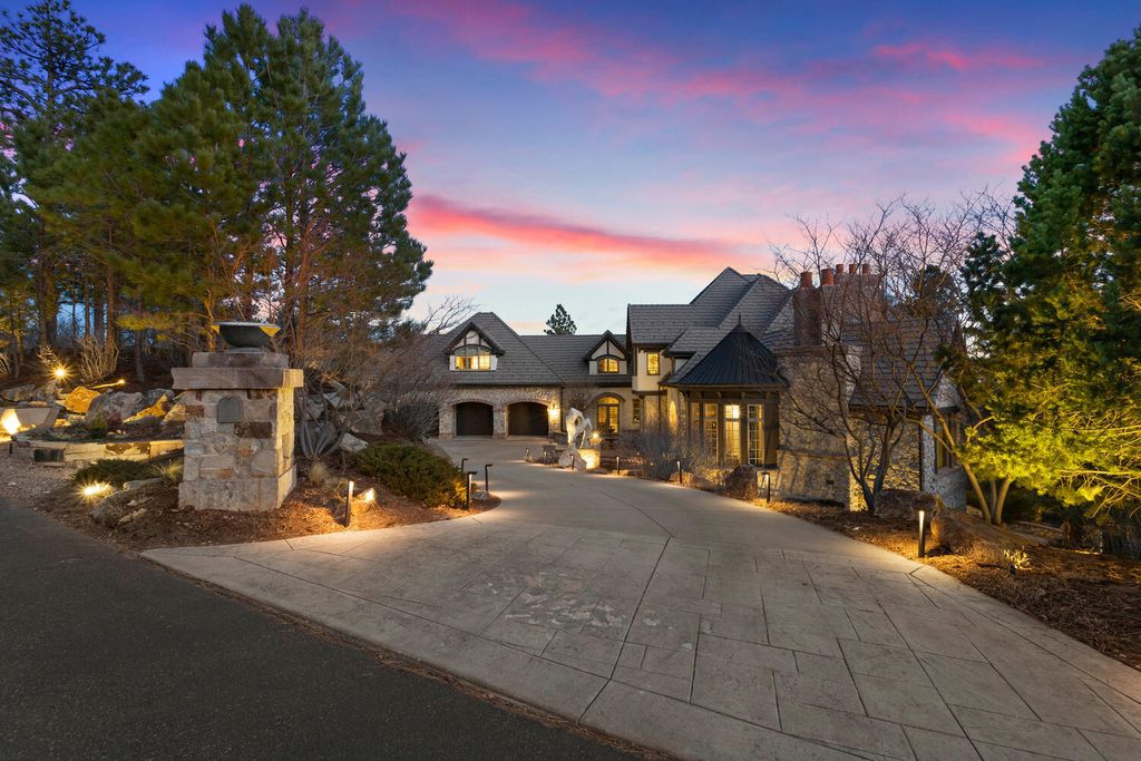4 Eagle Pointe Lane, Castle Rock, Colorado is a a stunning renovation of a 2003 Trillium Home with the sweeping layout, along with dramatic wall and ceiling treatments, immaculate wood features, multiple fireplaces, and high-end designer finishes.