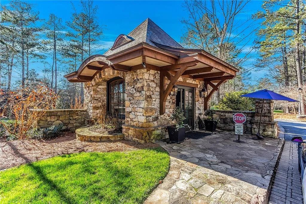 The House in Suwanee features an expansive professionally landscaped lot and tons of outdoor living space perfect for entertaining now available for sale. This home located at 918 Big Horn Holw, Suwanee,  Georgia