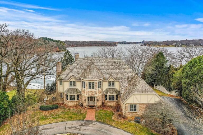 Discover the Tranquil Serenity of Lakeside Living in this $4.495M Stunning Oconomowoc Lake, WI
