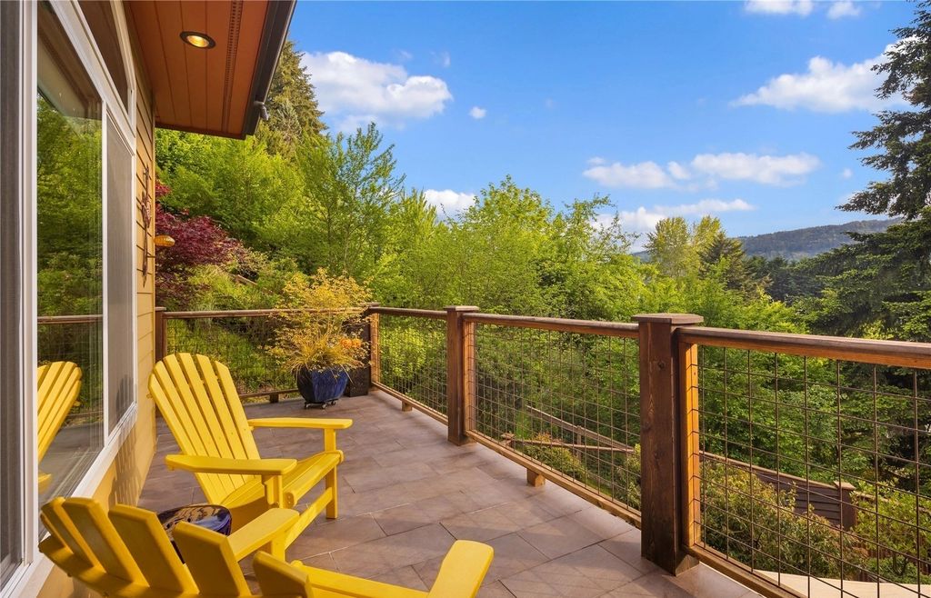 The House in Sammamish offers sun-drenched interiors, ample privacy and luxurious upgrades throughout, now available for sale. This home located at 4160 212th Way SE, Sammamish, Washington