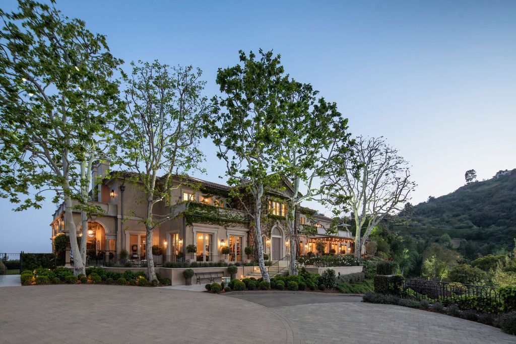10702 Levico Way, Los Angeles, California is a sensational views villa with exceptional facade and romantic, verdant vines scaling its exterior. Magical setting offers a true escape without having to leave Bel-Air.