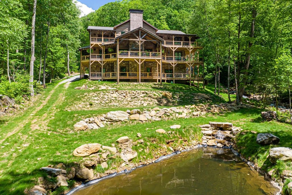 The Estate in Canton incorporates elements from the land with sustainable materials, now available for sale. This home located at 16 Gihon Waters Trl, Canton, North Carolina