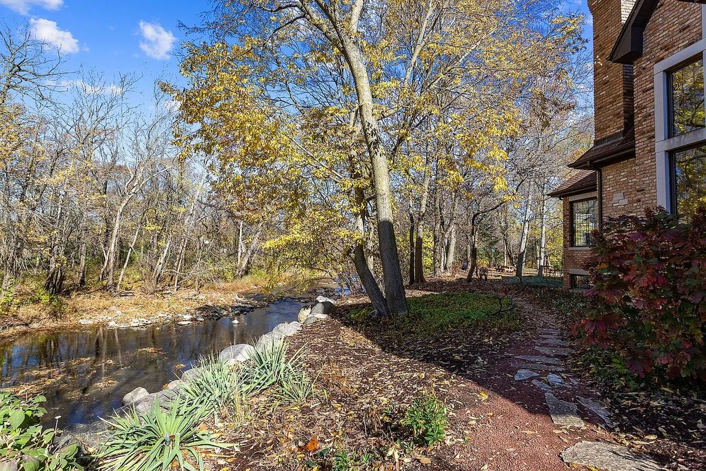 The Residence in Morris is surrounded by majestic, mature trees leading to your own private paradise, now available for sale. This home located at 4965 Cemetery Rd, Morris, Illinois