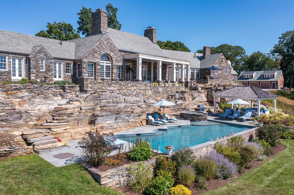 The Estate in Lyme is designed by Alfred Hopkins, a renowned estate architect, also built estates for Louis Comfort Tiffany and Frederick Vanderbilt, now available for sale. This home located at 153 Ferry Rd, Lyme, Connecticut