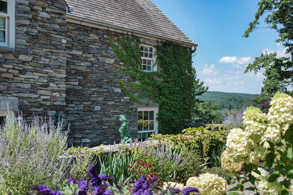 The Estate in Lyme is designed by Alfred Hopkins, a renowned estate architect, also built estates for Louis Comfort Tiffany and Frederick Vanderbilt, now available for sale. This home located at 153 Ferry Rd, Lyme, Connecticut