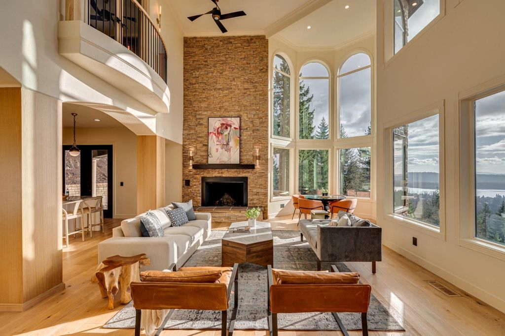 The Chateau in Washougal offers privacy and security with stunning sunsets, city and river views, now available for sale. This home located at 2150 N 14th St, Washougal, Washington