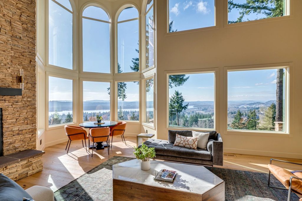 The Chateau in Washougal offers privacy and security with stunning sunsets, city and river views, now available for sale. This home located at 2150 N 14th St, Washougal, Washington